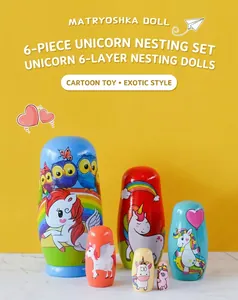 Detail of 6-layer nesting dolls featuring hand-painted unicorn and owl animal patterns