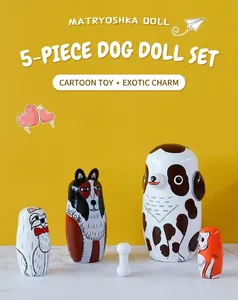Detail of five-layer dog themed hand-painted wooden nesting dolls for kids