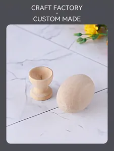 Detailed view of natural unpainted wood egg and matching stand on marble surface