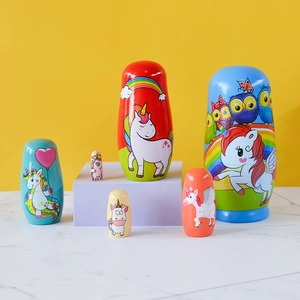 6-piece wooden unicorn matryoshka nesting dolls with colorful rainbow hand-painted designs