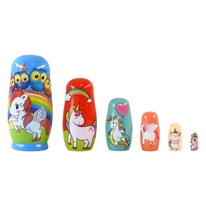 Handcrafted unicorn Russian nesting dolls set made of wood with colorful rainbow designs
