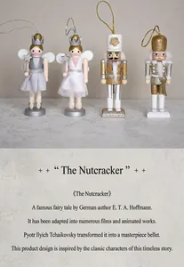 Detail of wooden nutcracker fairy and soldier figures with silver glitter and paint