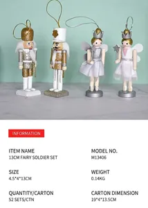 Detail view of 13cm wooden nutcracker fairy and soldier ornaments with gold glitter finish