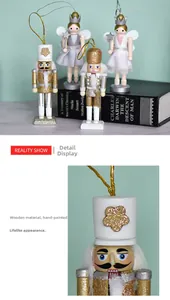 Close-up of hand-painted wooden nutcracker soldiers and fairy ornaments with glitter details
