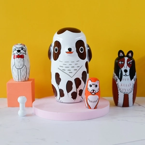 Handcrafted wooden nesting dolls featuring dalmatian and dog motifs for kids' gift