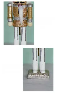 Detailed close-up of gold glitter nutcracker soldier with stable wide square base