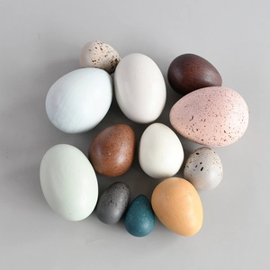 Set of 12 hand-painted wooden easter eggs in various sizes for home and office decor