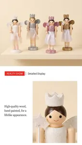 Detailed view of four wooden nutcracker fairy ornaments with glitter crowns and star wands