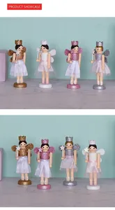 Set of four colorful wooden fairy nutcracker ornaments with glitter wings and wands