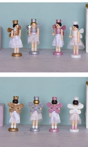 Set of four wooden fairy nutcracker ornaments in gold, silver, pink and white with sequins