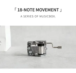 Mechanical 18-note hand-crank music box movement in polished zinc alloy finish