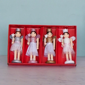 Set of 4 wooden fairy nutcracker ornaments with glitter wings in a red gift box