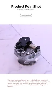 Macro shot of Yunsheng music box movement with silver metal gears and black casing