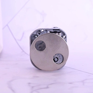 Mechanical music box movement with circular metal rotating plate and precision gears