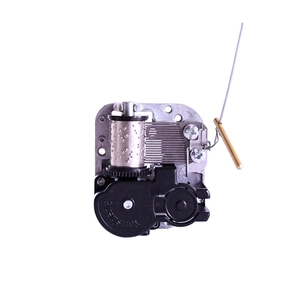 Mechanical wind-up music box movement with brass rod brake and silver metal base