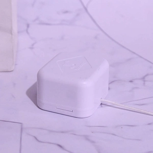 Mini mechanical pull string music box accessory in white ABS plastic for DIY craft projects