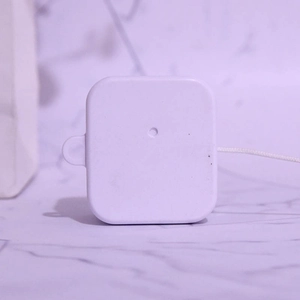Mini mechanical pull string music box movement in white plastic for DIY decorative projects