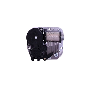 Mechanical 18-note music box movement with silver metal base and black gear housing