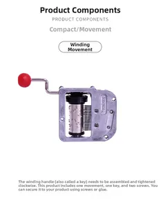Macro view of 18-note DIY mechanical music box movement with red handle and screws