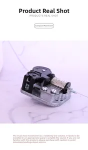 Mechanical music box movement with zinc alloy gears and a manual winding knob
