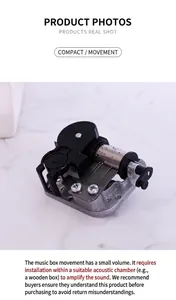Macro shot of mechanical music box movement with silver cylinder and black base