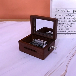 Boîte à musique mécanique en bois de noyer avec manivelle et miroir intérieur