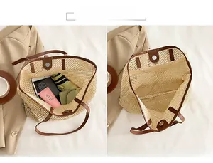 Detail view of large straw tote bag featuring main pocket and spacious interior storage