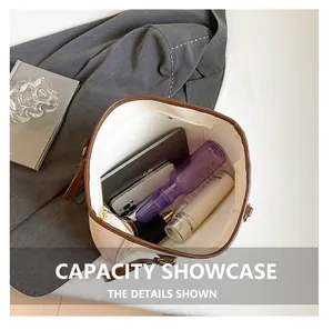 Spacious interior of a beige tote bag holding a tablet, water bottle and cosmetics