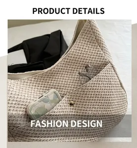 Detail view of woven straw tote bag texture with external pocket and accessories