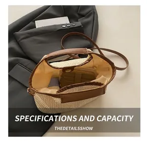 Top view of spacious straw bucket bag with leather straps and interior storage capacity