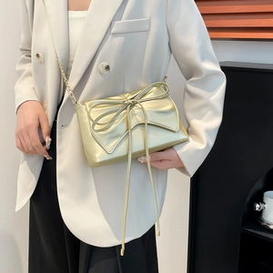 Elegant champagne gold pleated bow shoulder bag with fine metal chain strap for women