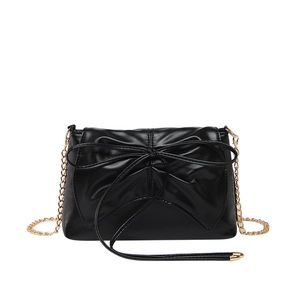 Chic black PU leather square shoulder bag with large bow detail and gold chain strap