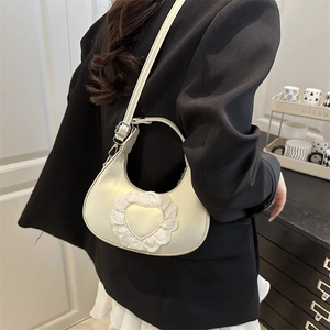 White hobo shoulder bag with large lace heart embroidery and adjustable strap