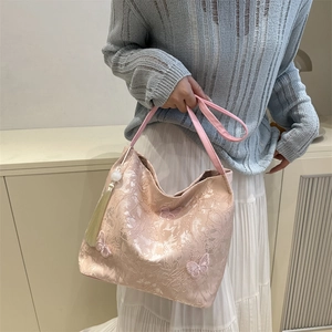 Fashionable floral jacquard tote bag with butterfly embroidery and tassel charm