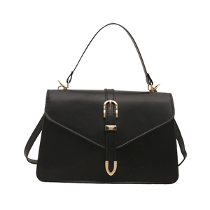 Classic black PU leather handbag with golden horseshoe buckle and adjustable strap