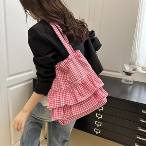 Pink and white gingham ruffle tote bag with tiered layers for a stylish summer look