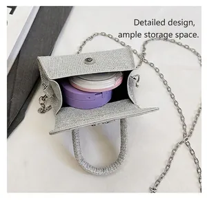 Close-up of silver glitter bag interior with chain strap showing storage capacity