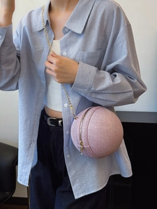 Pink spherical crossbody bag with glitter finish and gold chain strap for women