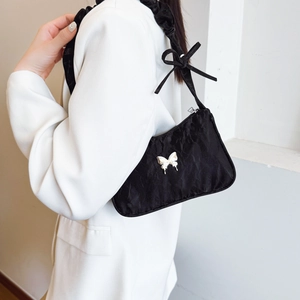 Black ruched shoulder bag with silver butterfly charm and bow strap, summer style