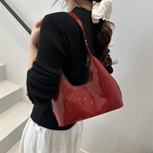 French vintage deep red patent leather hobo shoulder bag with a glossy half-moon shape