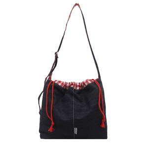 Blue denim bucket bag with red drawstring and checkered lining for daily commute