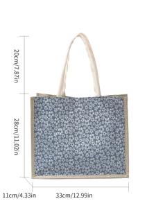 Linen tote bag with blue floral pattern and dimensions showing 33x28x11 cm size