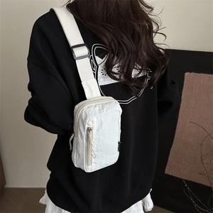 Minimalist white nylon crossbody bag for street sports with adjustable wide strap