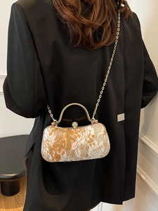 Elegant floral embroidery handbag with gold handle and sparkling rhinestone clasp for women