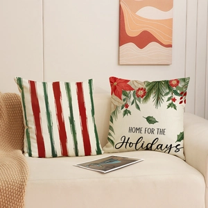 Set of two Christmas linen pillow covers with red stripes and festive holiday wreath print