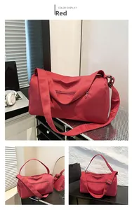Detail of red large capacity travel fitness bag with multi-compartment nylon structure