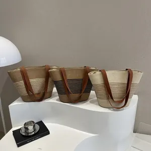 Detailed comparison of three woven tote bags in striped patterns and contrast colors