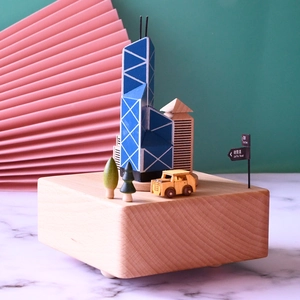 Hong Kong Bank of China Tower wooden music box with miniature city landmarks and Jaffe Road sign