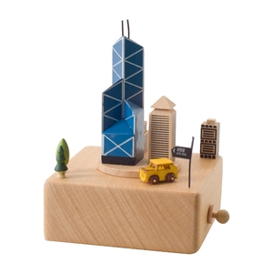 Wooden Bank of China Tower music box featuring a detailed Hong Kong city landscape