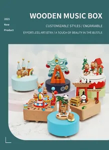 Various wooden music box themes including carousel and circus on marble display